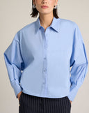 Camicia Boxy con Spalle Calate e Taglio Geometrico Frontale